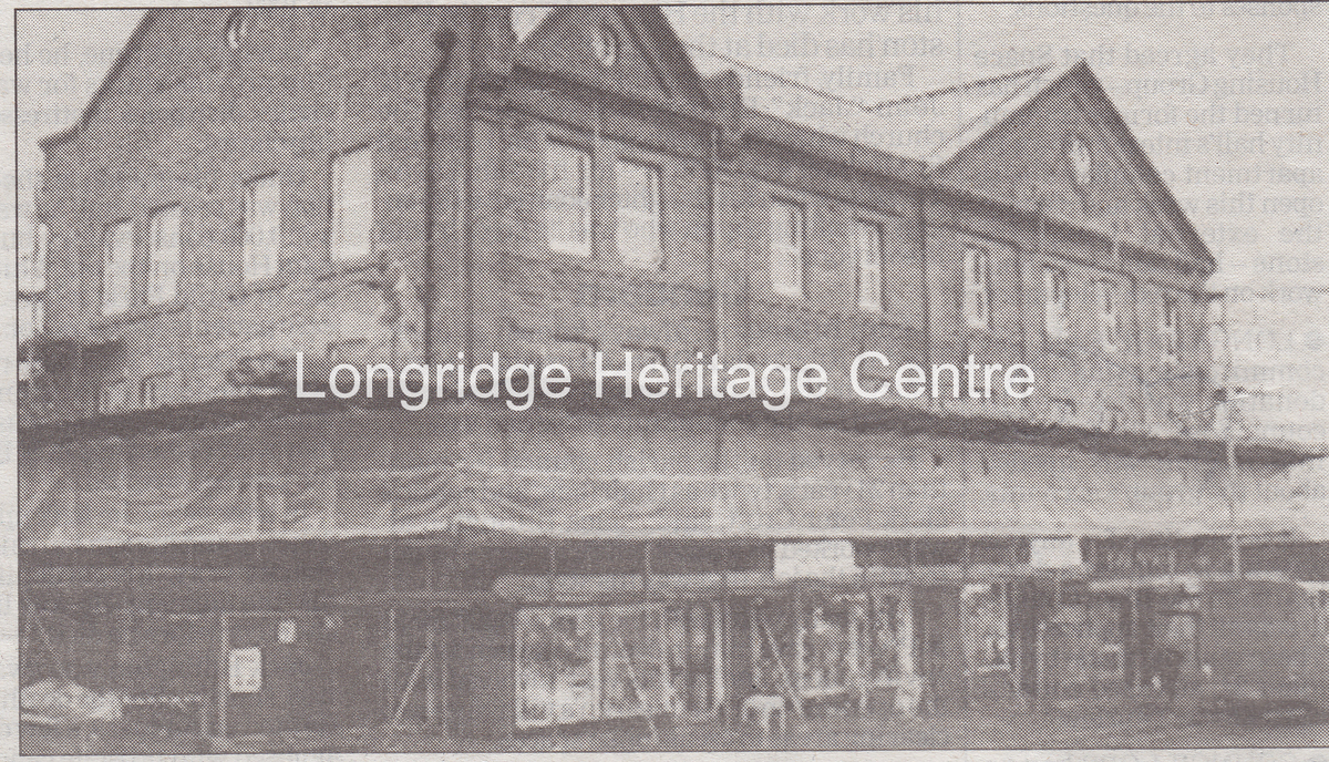 861A - Co-op building - Newspaper clipping front of main building with scaffolding - Unknown